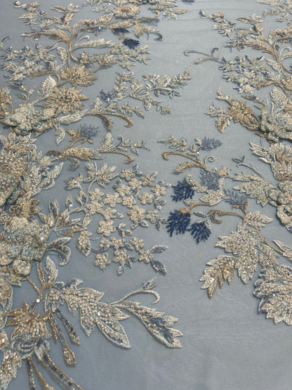 TUL BORDADO AZUL CIELO CON PEDRERIA Y FLORES DORADA